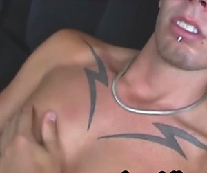Smooth Chested Tattooed Lad Wanks Off