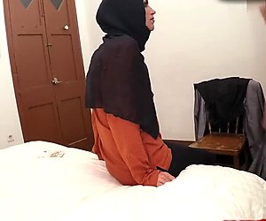 Arab chick is worried to lose her hijab when sucking cock